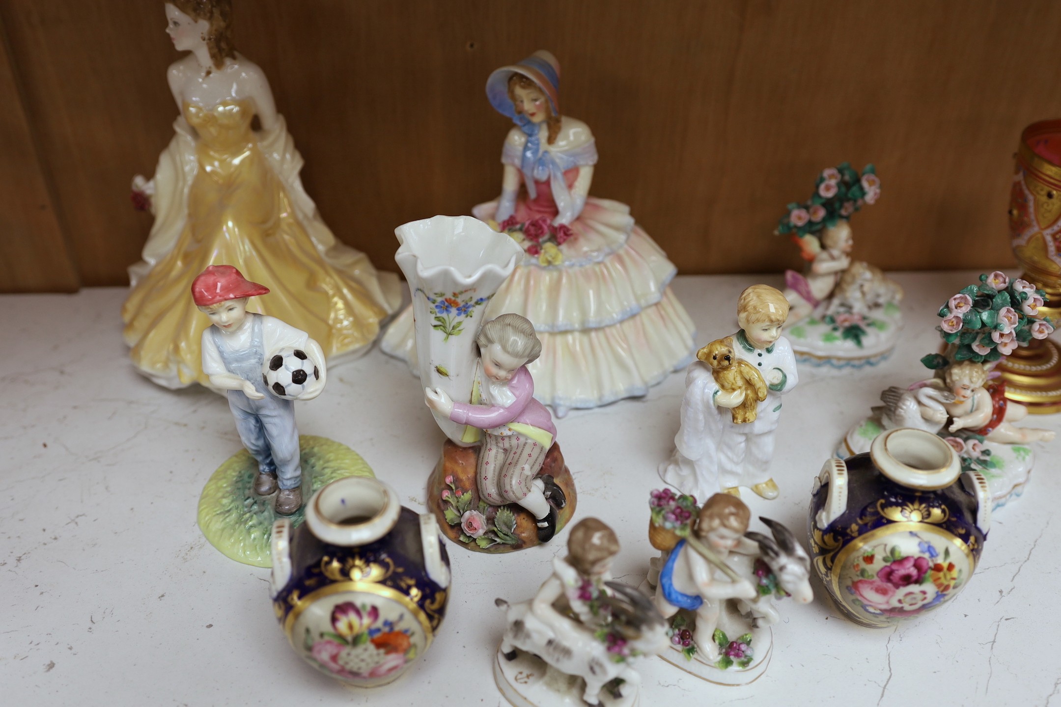 A selection of various miniature ceramics and figurines, to include Royal Crown Derby two handled vases with central panelled section display of flower, together with Royal Doulton figures, tallest 19cm